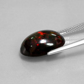 5.05カラットの天然マルチカラーブラックオパール（16×10.7 mm・オーバルカット）