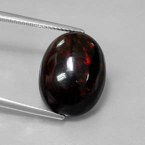 8.82カラットの天然マルチカラーブラックオパール（18×13.7 mm・オーバルカット）