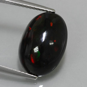 4.34カラットの天然マルチカラーブラックオパール（15.4×10.7 mm・オーバルカット）