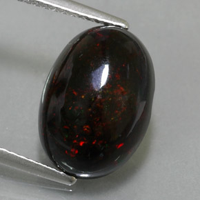 3.63カラットの天然マルチカラーブラックオパール（14.1×10 mm・オーバルカット）