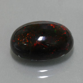 3.63カラットの天然マルチカラーブラックオパール（14.1×10 mm・オーバルカット）