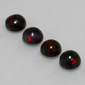 カラットの天然マルチカラーブラックオパール（6.08 mm・ラウンドカット）