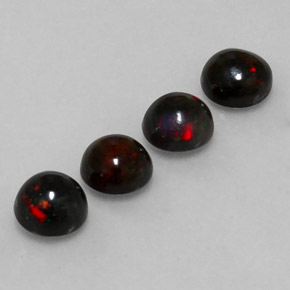 カラットの天然マルチカラーブラックオパール（6.08 mm・ラウンドカット）