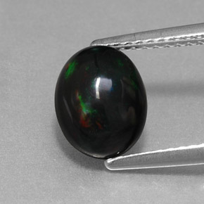 1.27カラットの天然マルチカラーブラックオパール（9.1×7.1 mm・オーバルカット）
