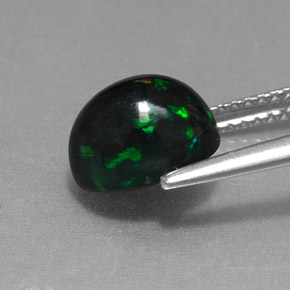 1.58カラットの天然マルチカラーブラックオパール（9×7 mm・オーバルカット）