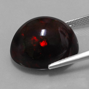 13.63カラットの天然マルチカラーブラックオパール（17.9×15.2 mm・オーバルカット）