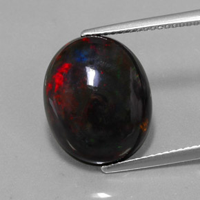 5.81カラットの天然マルチカラーブラックオパール（15.5×12.6 mm・オーバルカット）