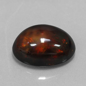 6.02カラットの天然マルチカラーブラックオパール（15.3×11.4 mm・オーバルカット）