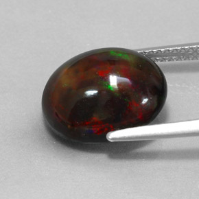4.31カラットの天然マルチカラーブラックオパール（13.4×11 mm・オーバルカット）