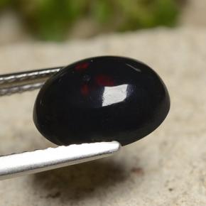 1.50カラットの天然マルチカラーブラックオパール（10.1×8 mm・オーバルカット）