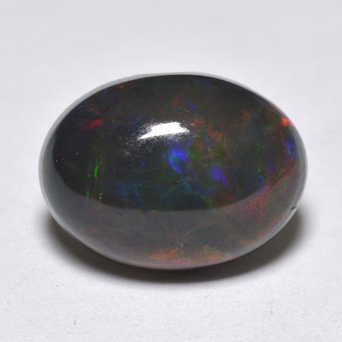 1.33カラットの天然マルチカラーブラックオパール（9.4×7 mm・オーバルカット）