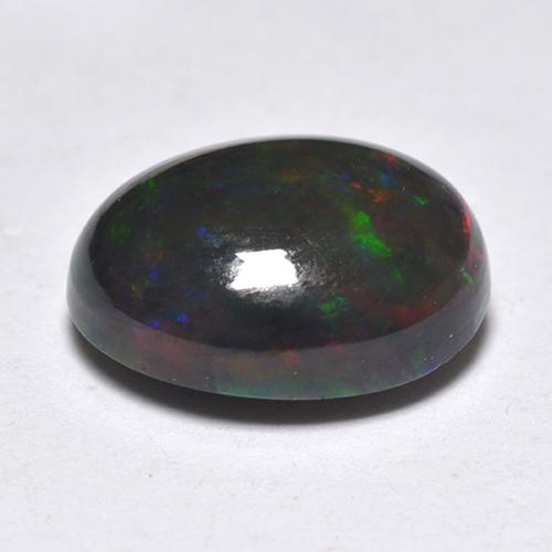 1.33カラットの天然マルチカラーブラックオパール（9.4×7 mm・オーバルカット）