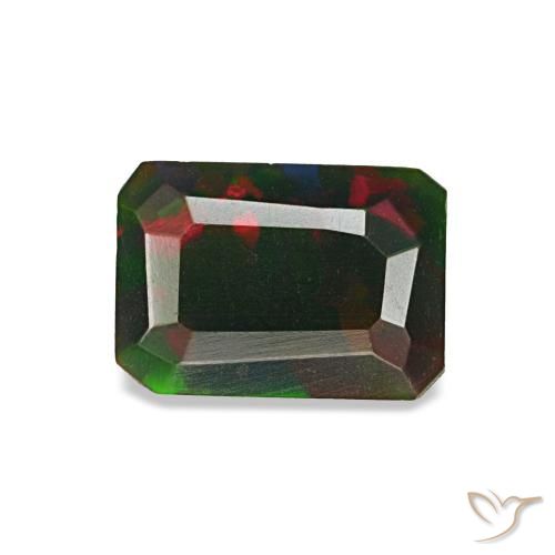 0.57カラットの天然マルチカラーブラックオパール（6.6×4.7 mm・エメラルドカット）