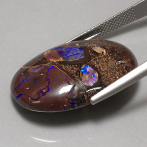 32.09カラットの天然マルチカラーボルダーオパール、オーバルカット、オペーク