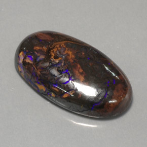 12.97カラットの天然マルチカラーボルダーオパール（21.7×12.6 mm・オーバルカット）