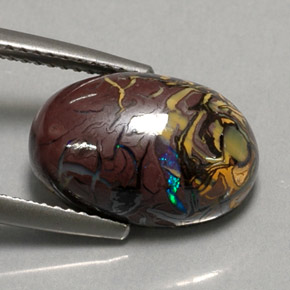 6.95カラットの天然マルチカラーボルダーオパール、オーバルカット、オペーク