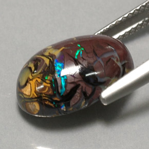 6.95カラットの天然マルチカラーボルダーオパール、オーバルカット、オペーク