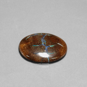 11.05カラットの天然マルチカラーボルダーオパール（22.2×18 mm・オーバルカット）