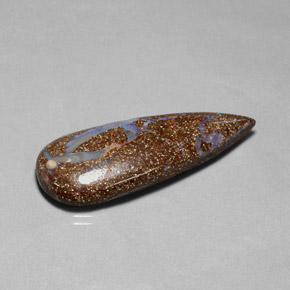 26.52カラットの天然マルチカラーボルダーオパール（43.3×18 mm・洋梨の形）
