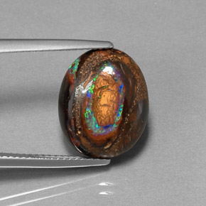 7.70カラットの天然マルチカラーボルダーオパール（15×12.2 mm・オーバルカット）