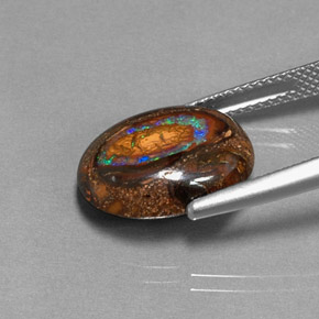 7.70カラットの天然マルチカラーボルダーオパール（15×12.2 mm・オーバルカット）
