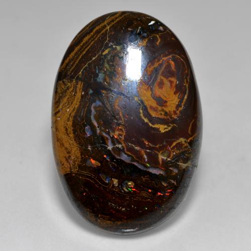 33.36カラットの天然マルチカラーボルダーオパール（28.1×19 mm・オーバルカット）