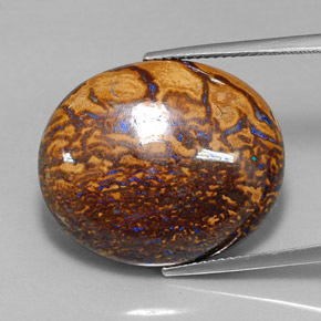 34.21カラットの天然マルチカラーボルダーオパール（23.4×19.6 mm・オーバルカット）