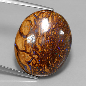 34.21カラットの天然マルチカラーボルダーオパール（23.4×19.6 mm・オーバルカット）