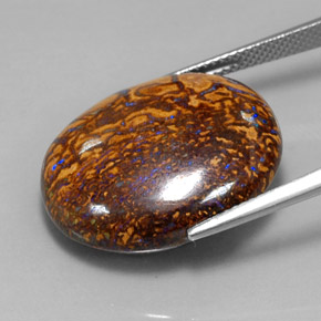 34.21カラットの天然マルチカラーボルダーオパール（23.4×19.6 mm・オーバルカット）