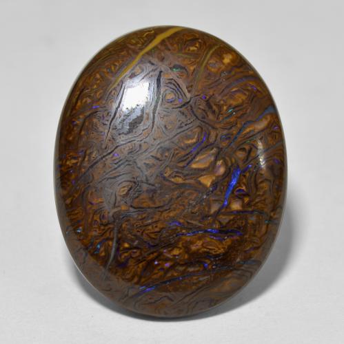 22.16カラットの天然マルチカラーボルダーオパール（22.7×18.1 mm・オーバルカット）