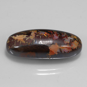 15.56カラットの天然マルチカラーボルダーオパール（23.7×9.8 mm・オーバルカット）