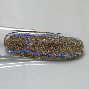 13.97カラットの天然マルチカラーボルダーオパール（40.1×13 mm・オーバルカット）