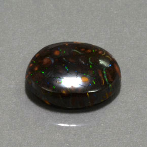 6.61カラットの天然マルチカラーボルダーオパール（13.3×11.8 mm・オーバルカット）