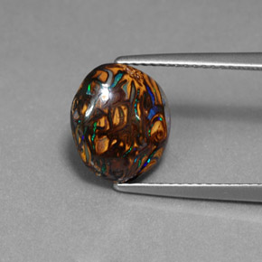 3.41カラットの天然マルチカラーボルダーオパール（11×9.5 mm・オーバルカット）