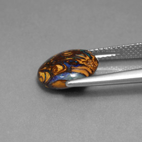 3.41カラットの天然マルチカラーボルダーオパール（11×9.5 mm・オーバルカット）