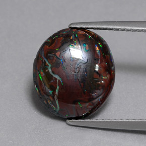 6.51カラットの天然マルチカラーボルダーオパール（13.1×11.7 mm・オーバルカット）