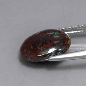 6.51カラットの天然マルチカラーボルダーオパール（13.1×11.7 mm・オーバルカット）