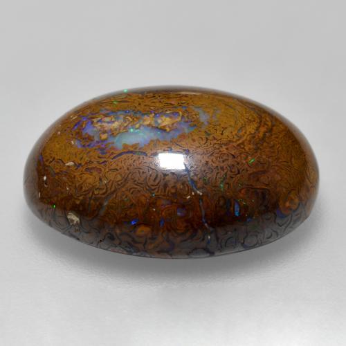 15.56カラットの天然マルチカラーボルダーオパール（19.3×14.3 mm・オーバルカット）