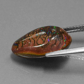 7.10カラットの天然マルチカラーボルダーオパール、ファンシー、オペーク