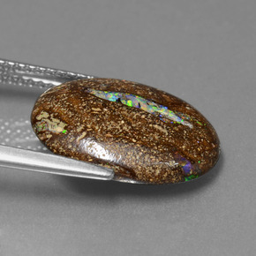 5.89カラットの天然マルチカラーボルダーオパール、オーバルカット、オペーク