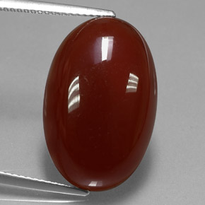 14.62カラットの天然レッドオレンジカーネリアン（21.7×14 mm・オーバルカット）