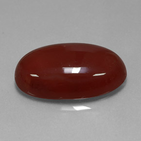 13.99カラットの天然レッドオレンジカーネリアン（21.7×14 mm・オーバルカット）