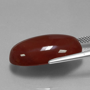 13.99カラットの天然レッドオレンジカーネリアン（21.7×14 mm・オーバルカット）