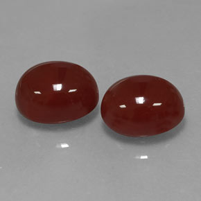 カラットの天然茶色がかった赤カーネリアン（10.1×8.1 mm・オーバルカット）