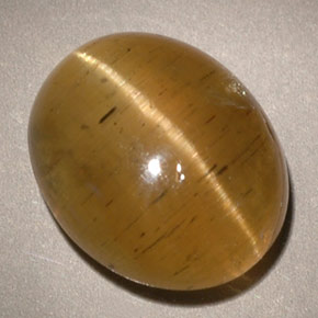 5.96カラットの天然イエローグリーンキャッツアイアパタイト、透明、透明/半透明