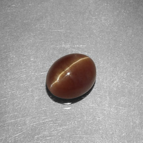 1.47カラットの天然ハニーCat's Eye Apatite（7×5.7 mm・オーバルカット）
