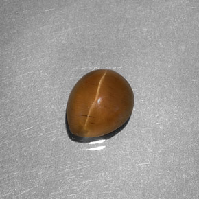 1.46カラットの天然ハニーCat's Eye Apatite（7.3×6 mm・洋梨の形）