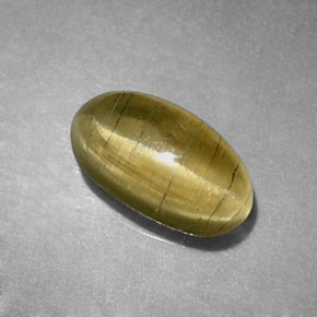 1.29カラットの天然イエローグリーンキャッツアイアパタイト、透明、透明/半透明