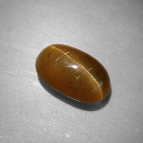 2.44カラットの天然ハニーCat's Eye Apatite（9.7×5.9 mm・オーバルカット）