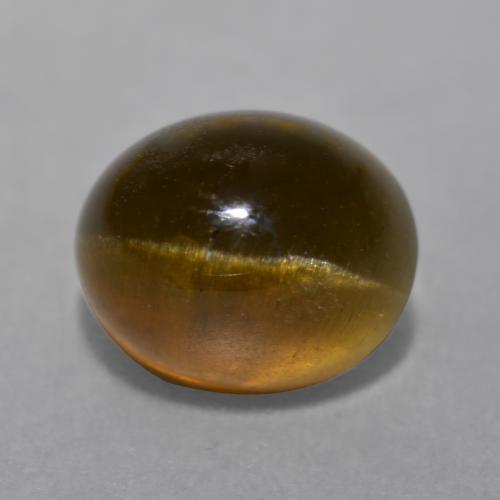 7.22カラットの天然ディープオレンジブラウンCat's Eye Apatite（11.4×9.4 mm・オーバルカット）
